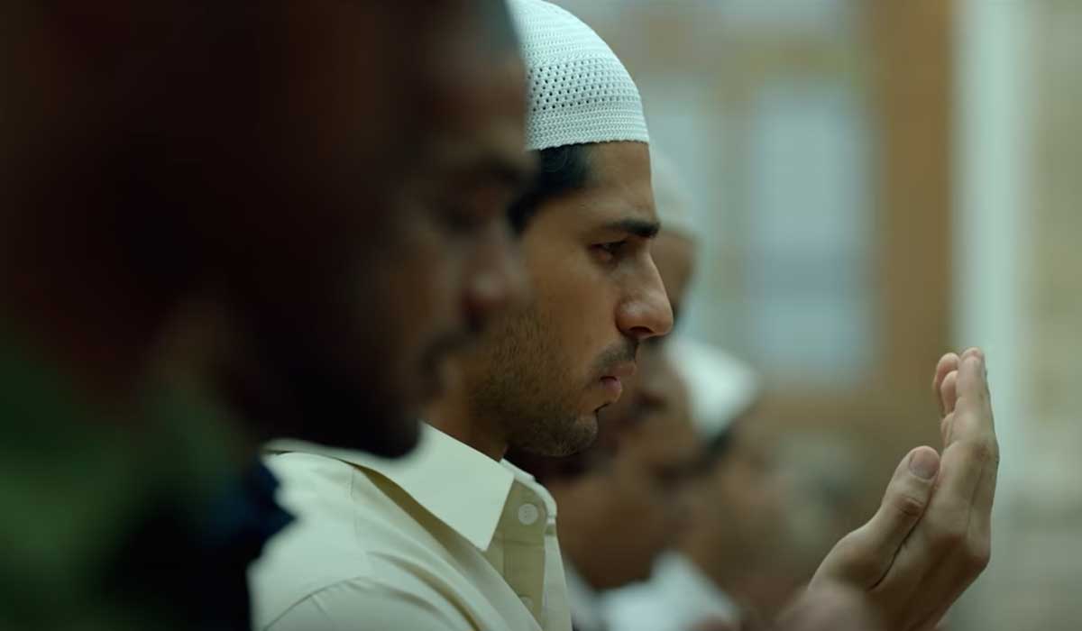 A scene in the movie showing the lead character offering prayers. — Screengrab via YouTube/Netflix India