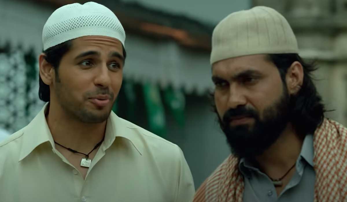 Actor Sidharth Malhotra portrays the stereotypical appearance with a skull cap and amulet in this scene. — Screengrab via YouTube/Netflix India