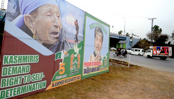 A huge poster is seen placed by the roadside in Faizabad on February 4, 2023. APP