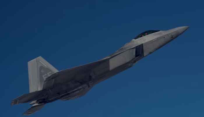 A US Air Force F-22 Raptor, based out of Al Udeid Air Base, Qatar, flies alongside a KC-135 Stratotanker during an aerial refuelling mission above an undisclosed location, in this undated handout picture released by US Air Force on July 29, 2019. — Reuters