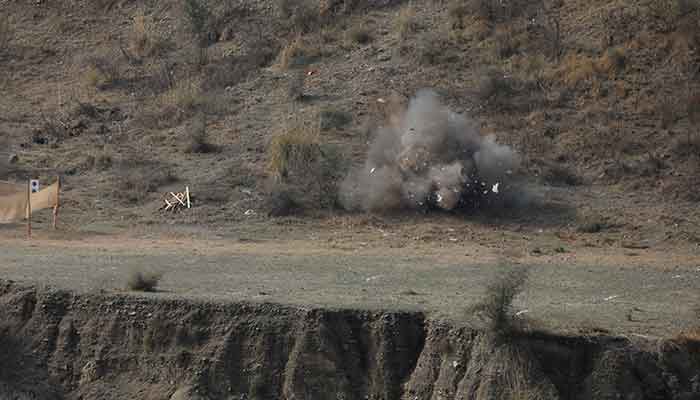 A blast is seen at a target firing practice during a training session at the Elite Police Training Centre in Nowshera, February 10, 2023. — Reuters