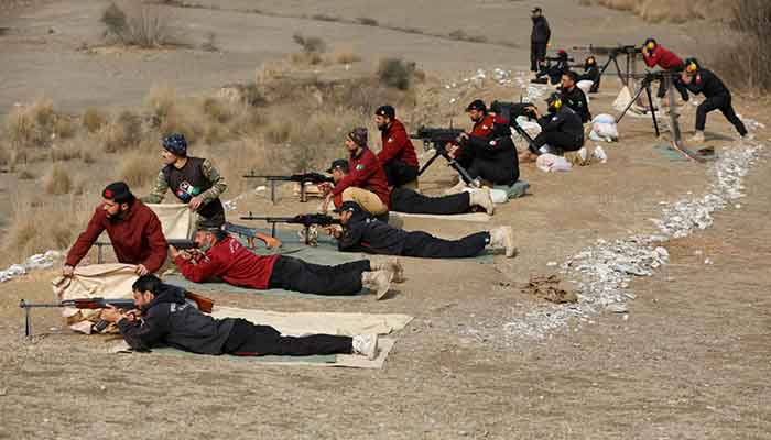 Police officers practice target shooting during a training session at the Elite Police Training Centre in Nowshera on February 10, 2023. — Reuters