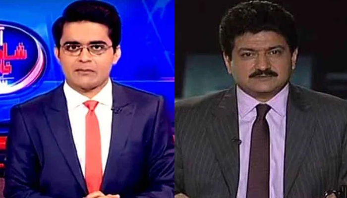 Anchorpersons Shahzeb Khanzada and Hamid Mir. — Screengrab
