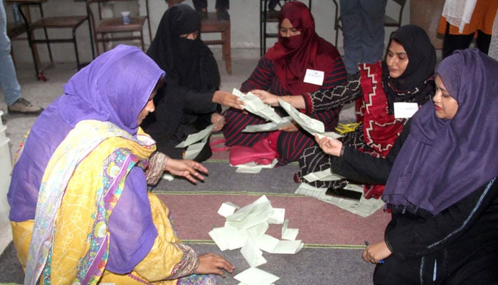 Female election staff counting votes in this undated photo. — APP/File
