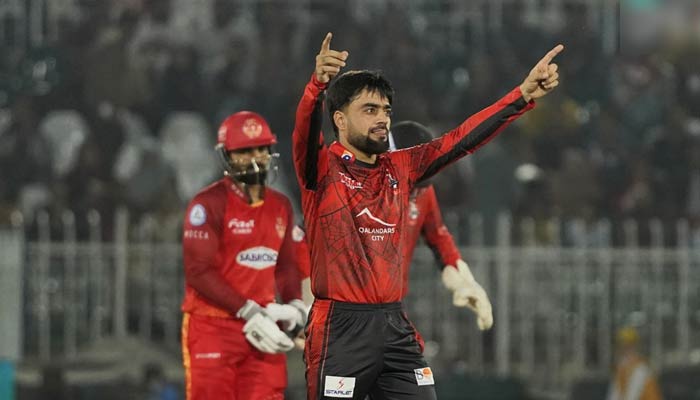 Lahore Qalandars Rashid Khan celebrates during the 26th match of the Pakistan Super League (PSL) at the Pindi Cricket Stadium on March 9, 2023. — PSL