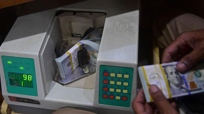 Rupee takes a hit against dollar in interbank market
