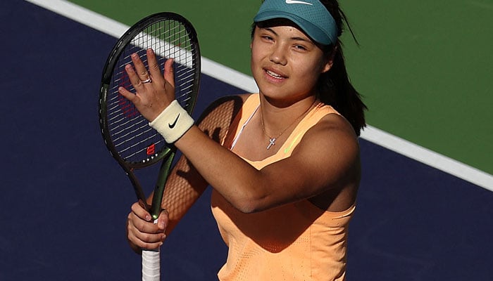 Emma Raducanu of Great Britain celebrates defeating Danka Kovinic of Montenegro in the first round during the BNP Paribas Open on March 09, 2023 in Indian Wells, California. AFP