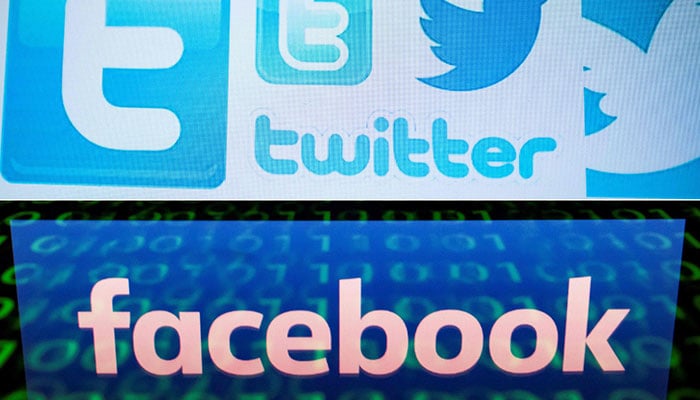 This combination of file pictures created on August 22, 2018 shows a photo illustration taken on March 23, 2018 of Twitter logos on a computer screen in Beijing and a file illustration picture taken on April 28, 2018 of the logo of social network Facebook displayed on a screen and reflected on a tablet in Paris.—AFP