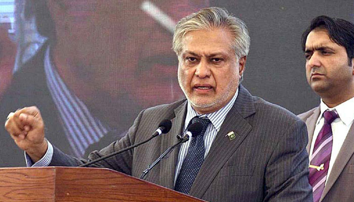 Finance Minister Ishaq Dar addressing a seminar in this undated photo. — APP/File