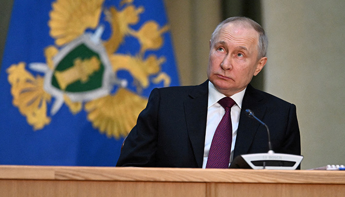 Russian President Vladimir Putin attends a meeting of the collegium of the Prosecutor Generals office in Moscow, Russia, March 15, 2023. — Reuters