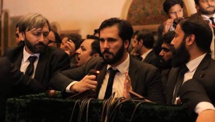 Hassaan Niazi, PTI Chairman Imran Khans nephew and focal person on legal affairs (centre). — Twitter@HamzaAzhrSalam