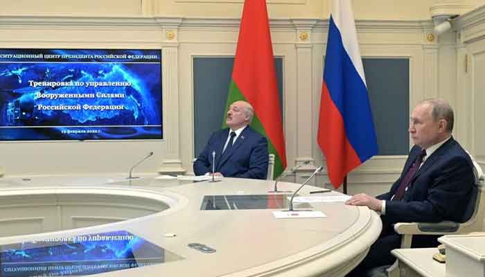 Russian President Vladimir Putin and Belarusian President Alexander Lukashenko observe training launches of ballistic missiles as part of the exercise of the strategic deterrence force, in Moscow, Russia February 19, 2022. — Reuters