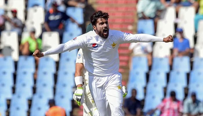 Mohammad Amir celebrates taking a wicket during a match on December 26, 2018. — AFP