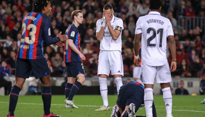 Real Madrid and Barcelona players during a La Liga match at Camp Nou. — AFP/File
