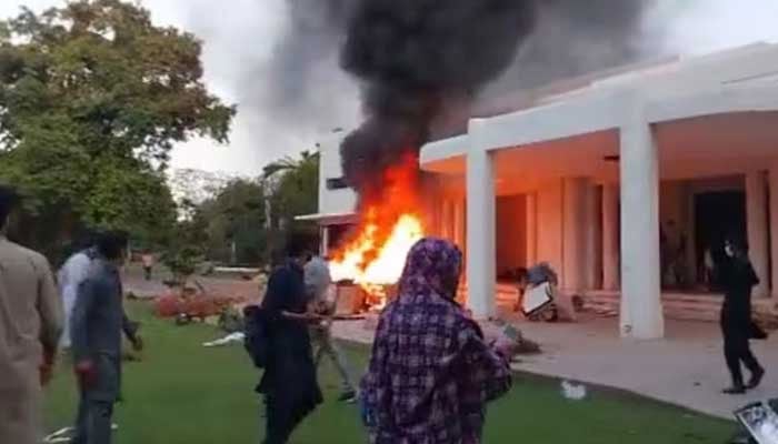Violent protesters — including women — barge into the Jinnah House following the arrest of PTI chief Imran Khan in Islamabad on May 10, 2023. — Twitter/File