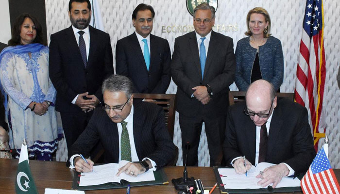 Economic Affairs Division Secretary Dr Kazim Niaz and USAID Mission Director to Pakistan Reed Aeschliman sign a new five-year bilateral Development Objectives Assistance Agreement at the Ministry of Economic Affairs on June 7, 2023. — PID