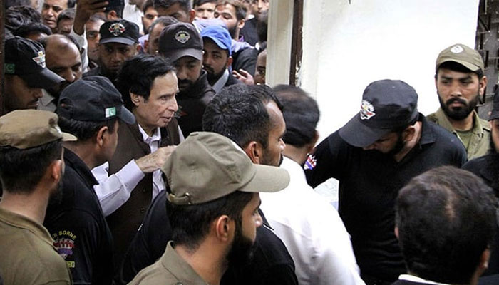 Pakistan Tehreek-e-Insaf (PTI) President Chaudhry Parvez Elahi leaving court after a case hearing, at District Court in Lahore on Friday, June 2, 2023. — PPI