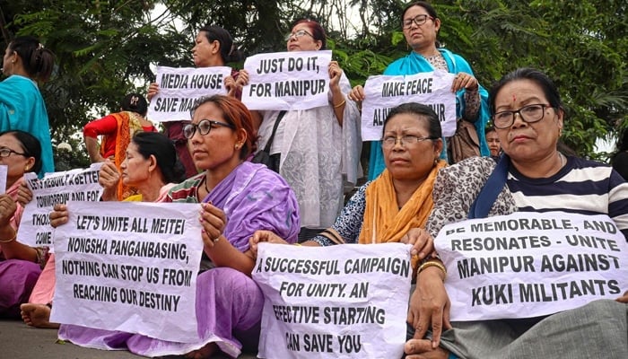 Khwairamband Ima Keithel Joint Coordinating Committee protest to demanding peace in Manipur outside the Governors gate in Imphal on July 28, 2023, during ongoing ethnic violence in India´s north-eastern state of Manipur. — AFP