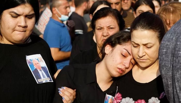 Many of those killed were buried the day after the disaster.—Reuters/file