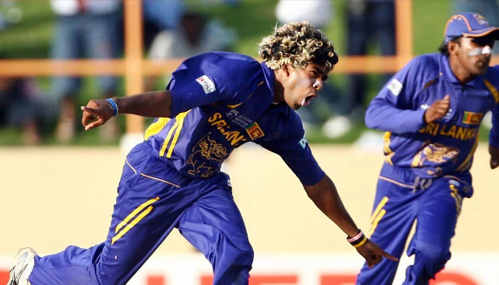 Lasith Malinga takes off after taking fourth wicket in a row on the last ball of the 49th over against South Africa. — AFP