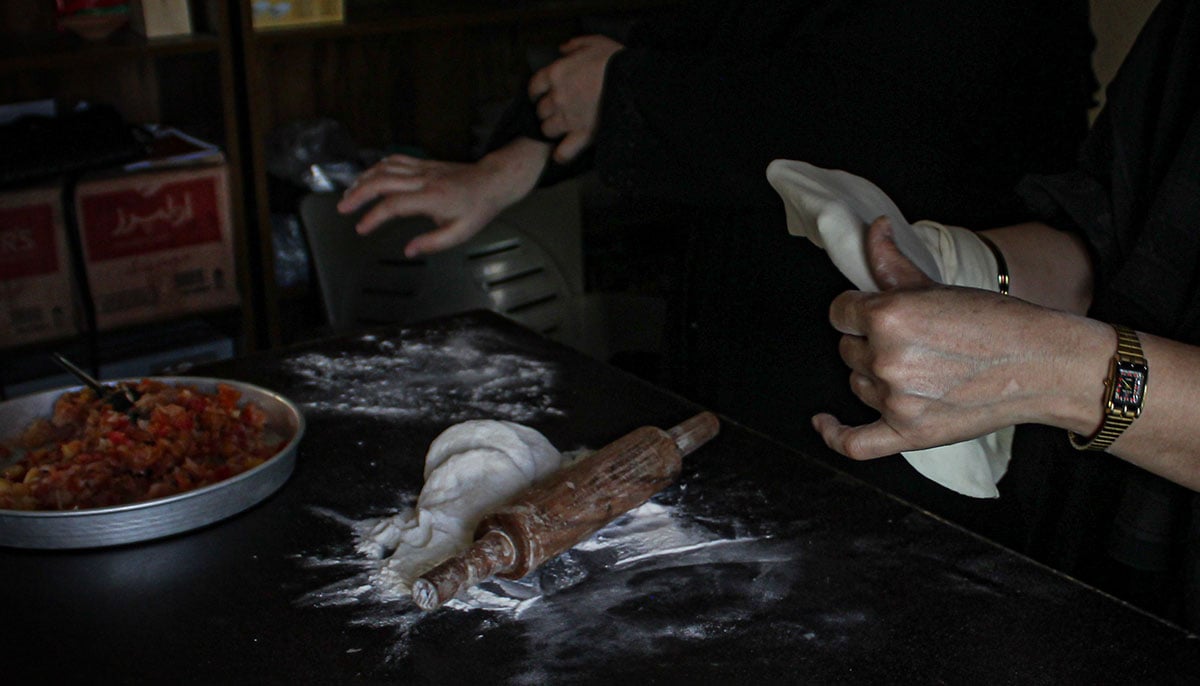Masooma prepares the dough for Bolani. — Hassaan Ahmed