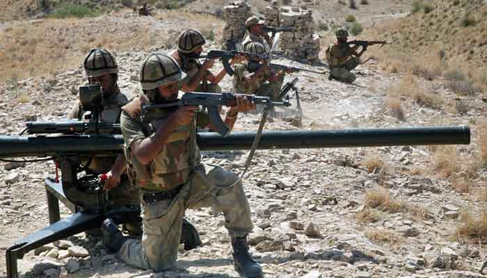 Pakistan Army soldiers are alert in case of any suspicious behaviour. —AFP