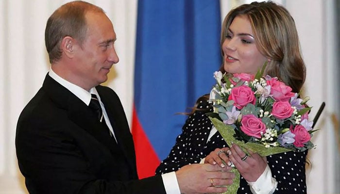 Russian President Vladimir Putin with longtime partner of Olympic gymnast Alina Kabaeva. — Kremlin/File