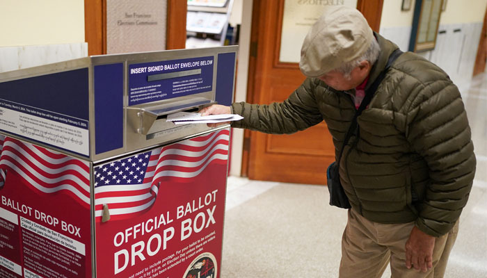 A voter casts their ballot during early voting, a day ahead of the Super Tuesday primary election, at the San Francisco City Hall voting centre in San Francisco, California, US March 4, 2024. — Reuters