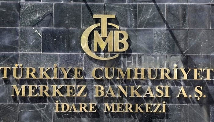 A picture shows the logo of Turkeys Central Bank (TCMB) at the entrance of the banks headquarters in Ankara, Turkey. — AFP/File