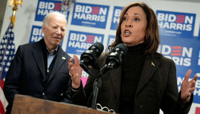 Vice President Kamala Harris speaks next to US President Joe Biden during the opening of the Biden for President campaign office in Wilmington, Delaware, US, February 3, 2024.—Reuters