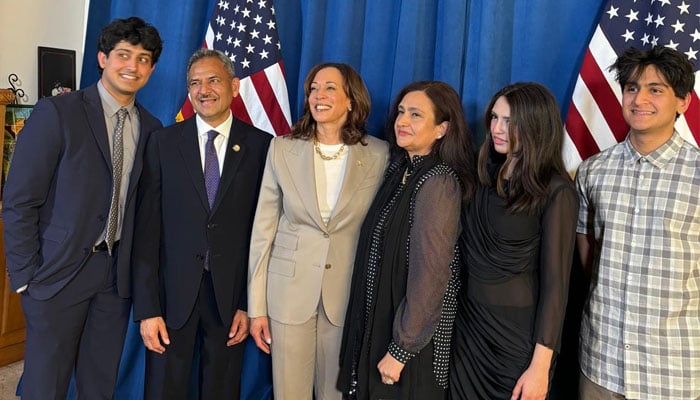 US Vice President Kamala Harris poses for a photo with Pakistani-American Democrat Dr Asif Mahmood and his family at a political event in Bradbury, California, on June 26, 2024. —  Dr Asif Mahmood