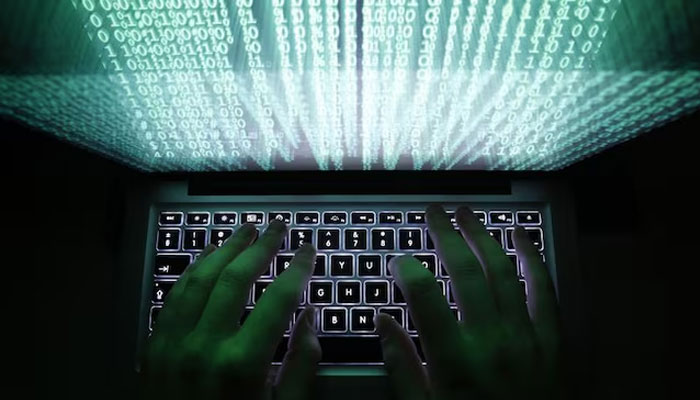 A representational picture of an person typing on a computer. — Reuters/File