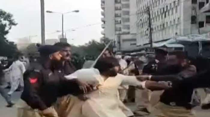 Edgy day for Karachi as two groups of protesters violate Section 144, clash with police
