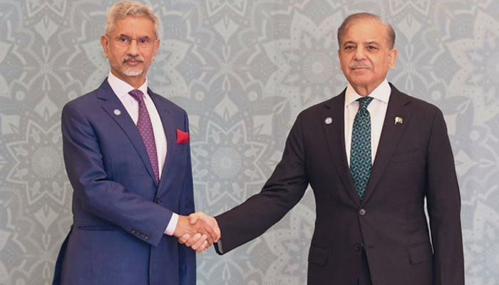 PM Shehbaz Sharif (right) shakes hands with Indian FM&nbsp;Subrahmanyam Jaishankar as the latter arrived at the Jinnah Convention Centre in Islamabad on October 16, 2024. &mdash; X/@DrSJaishankar