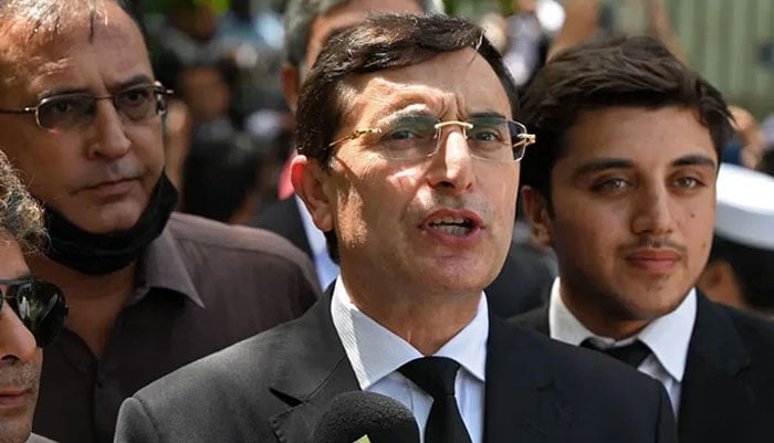 Barrister Gohar Ali Khan (centre), the leading lawyer of the legal team of imprisoned PTI founder Imran Khan, is speaking with the media. – AFP/File