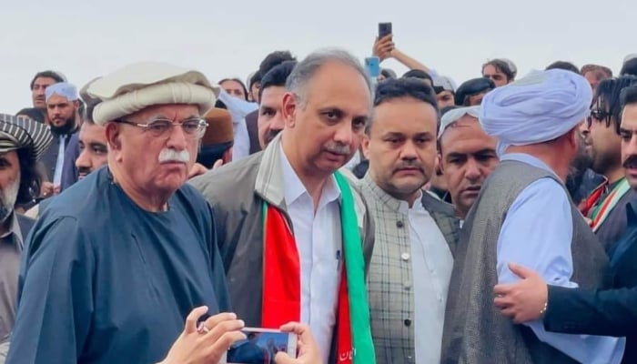 PkMAP Chairman Mahmood Khan Achakzai (left) with PTI leader Omar Ayub (centre) attending a protest in Chaman on April 13, 2024. —Facebook/ @MasherOfficial