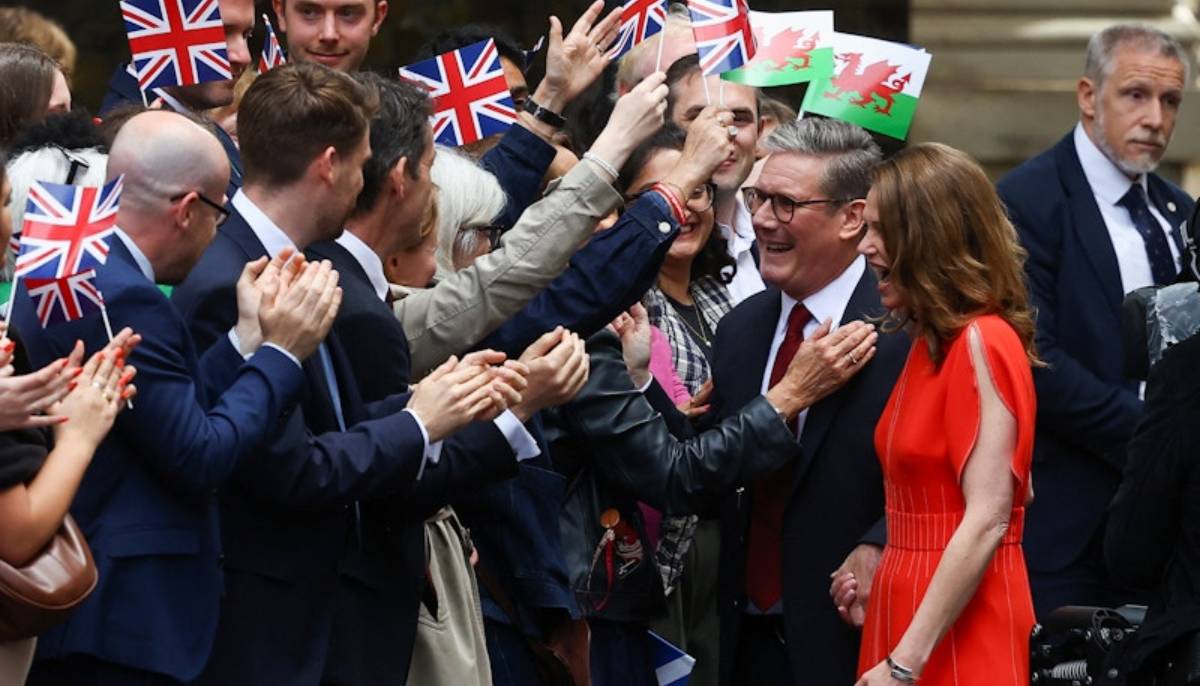 Labour party leader and current UK PM Keir&nbsp;Starmer and his wife Victoria greet supporters in Downing Street, July 5, 2024. &mdash; Reuters