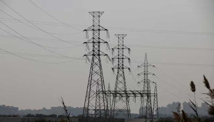 A power transmission tower in Karachi, Pakistan, January 24, 2023. — Reuters