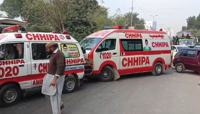 Ambulances are parked on the roadside on Shaheed-e-Millat road in Karachi on January 10, 2025. — Screengrab/ Reporter
