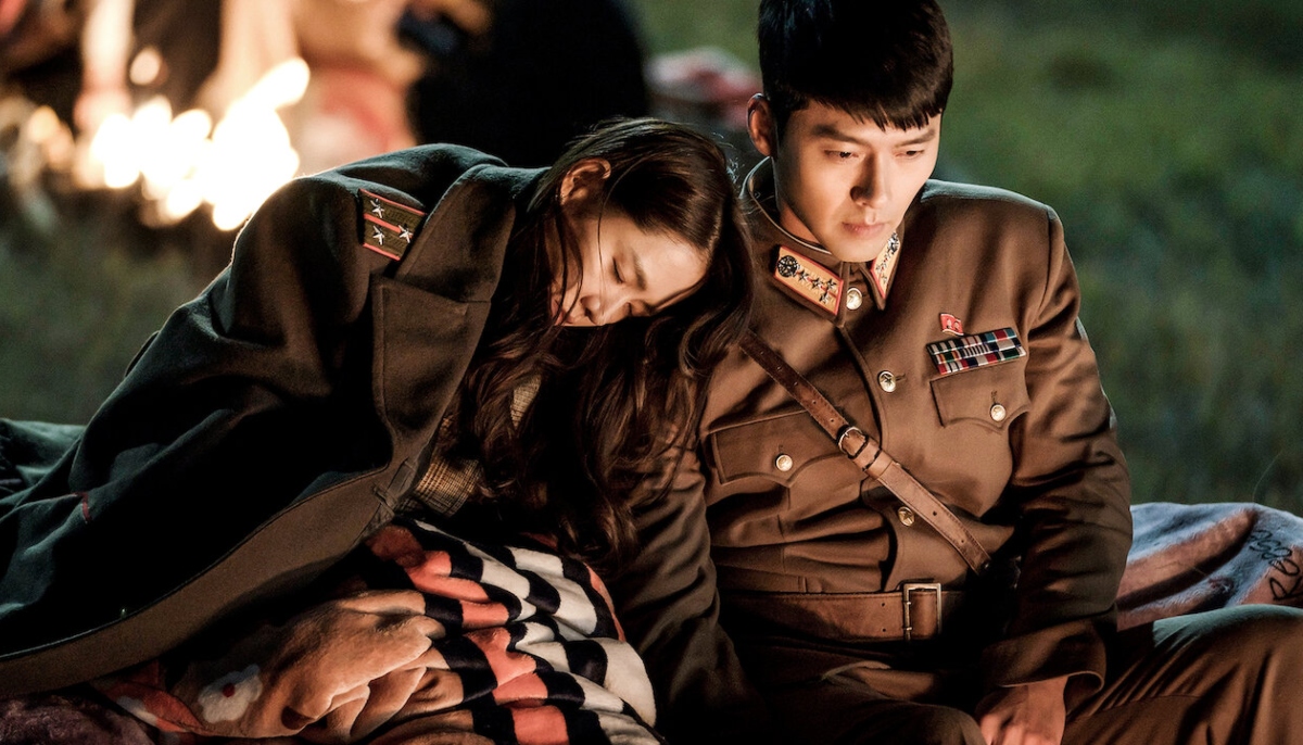 A scene from Korean drama Crash Landing on You showing its lead characters Yoon Se-ri (left) and Ri Jeong-hyeok played by Son Ye-jin and Hyun Bin. — Netflix
