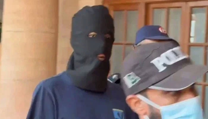 Police escort Armaghan, prime suspect in Mustafa Amir murder case, during an appearance before SHC on February 18, 2025. — Geo News