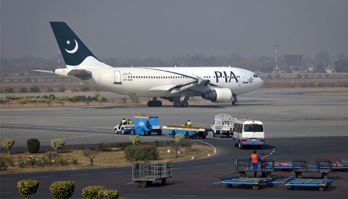 A Pakistan International Airlines (PIA) plane prepares to take-off at Alama Iqbal International Airport in Lahore February 1, 2012. —Reuters