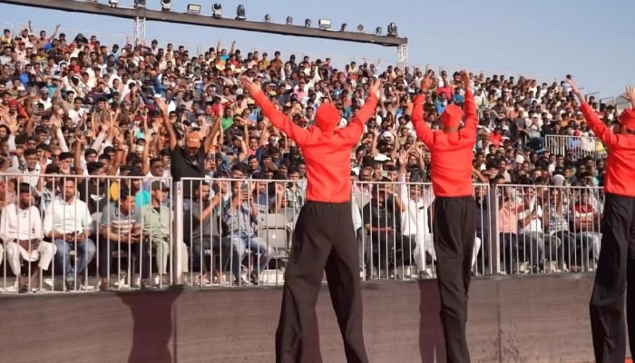 Performers entertain the audience at the grand Eid celebration event for workers in Dubai, UAE. — Reporter