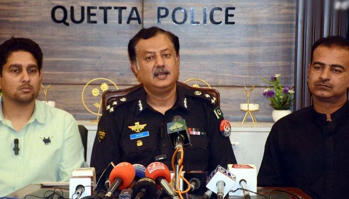 Quetta DIG Aitzaz Goraya (centre) pictured alongside government spokesperson Shahid Rind (right) during a press conference in Quetta on April 2, 2025. — INP