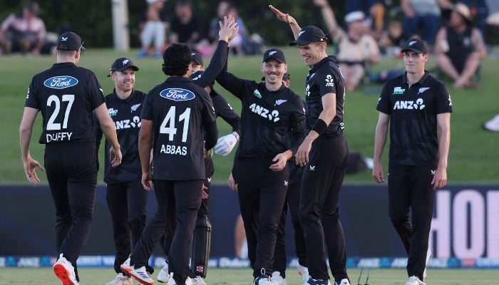 New Zealand players celebrate the wicket of Pakistan’s Usman Khan during the third one day international at Bay Oval in Mount Maunganui on April 5, 2025. — AFP