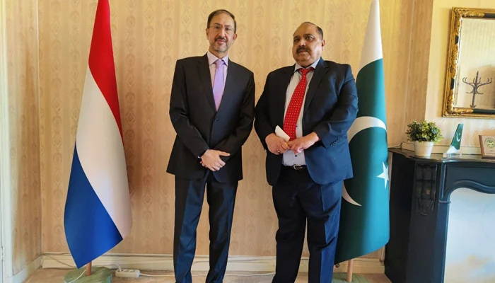 Syed Haider Shah (left) gestures for a photo. — Reporter