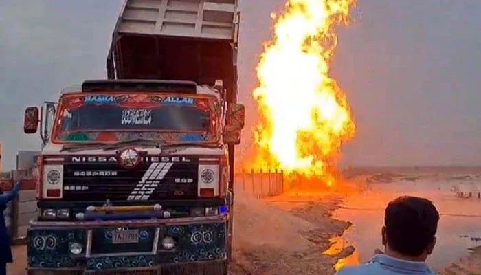 A raging fire near Korangi Crossing sends flames soaring into the sky, in Karachi on March 30, 2025. — PPI
