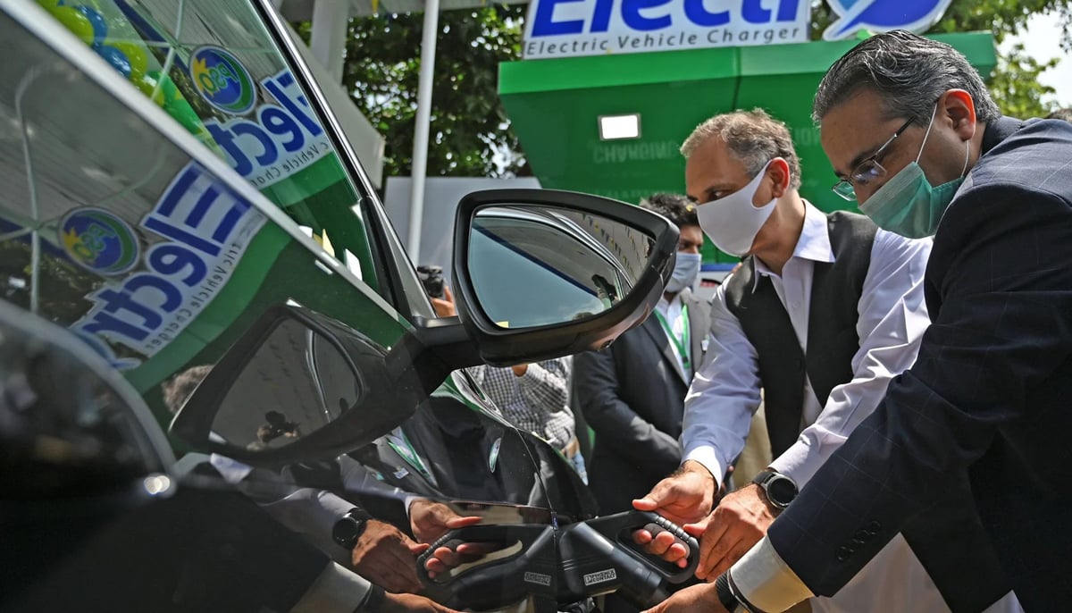 Former energy minister Omar Ayub Khan during the inauguration ceremony of Pakistans first EV charging station in Islamabad. — AFP/File