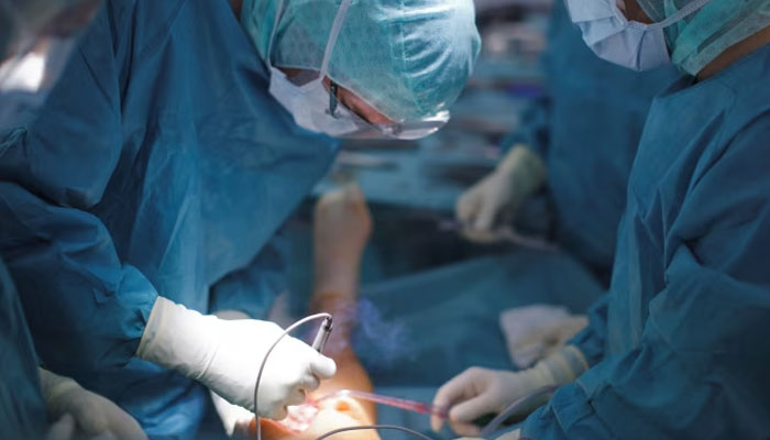 A representational image showing doctors performing a surgical procedure. — Reuters/File