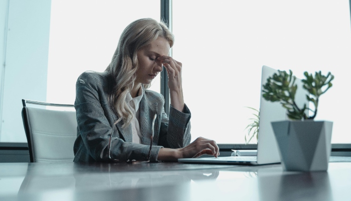This representational image shows a woman at work. — Pexels
